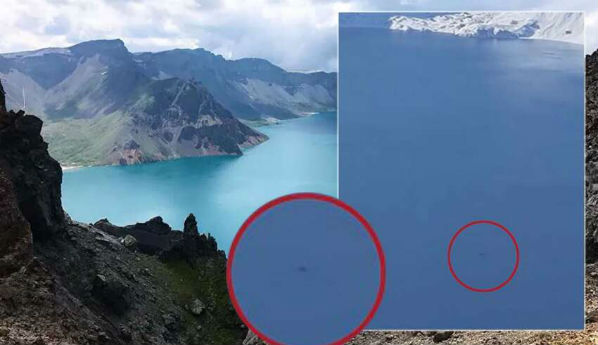 Um Homem registra um monstro lendário em um lago sagrado na China